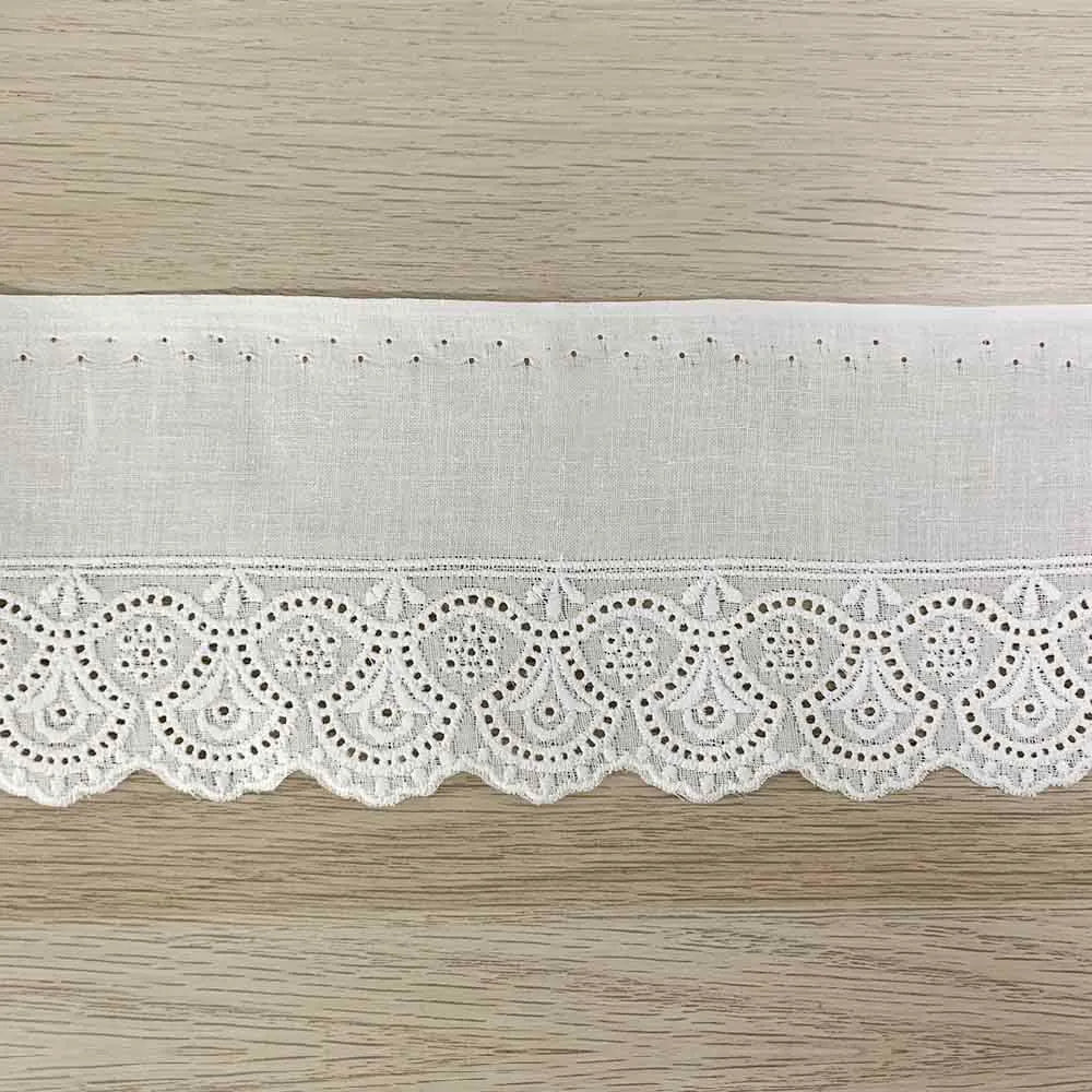 Image of white embroidered lace ribbon with a satin sheen – 40 mm – available online at Charlotte's Fabrics