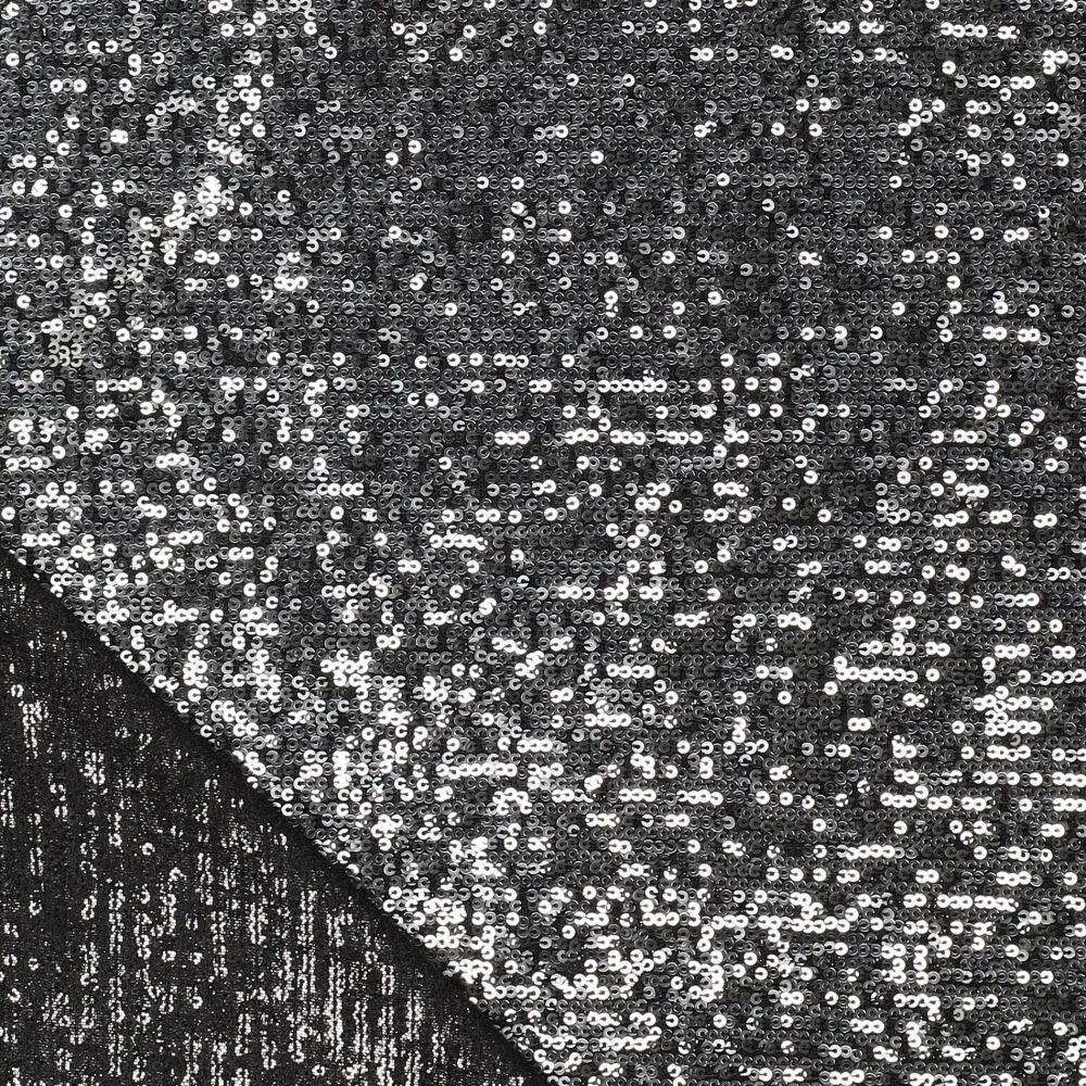 Tissu à paillettes - noir argent 285 g/m² – disponible chez Šarlotes audumi