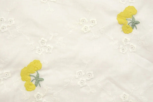 Embroidered cotton fabric - yellow flowers 110 g/m²