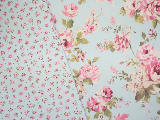 canvas fabric - roses on a light blue background 200 g/m²