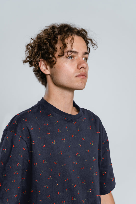 Image of cotton jersey knit - cherries on dark blue 200 g/m² – available at Šarlotes audumi
