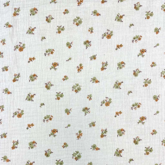 Muslin - fleurs sur fond orange 130 g/m²