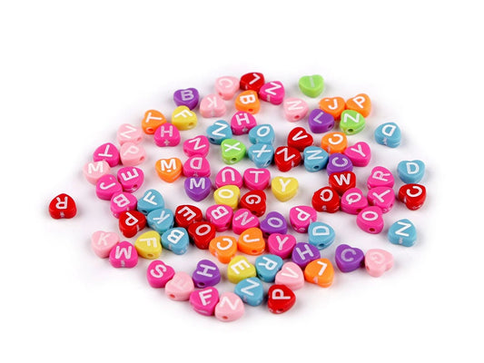 Image of plastic letter beads with hearts | Ø7 mm | 10 grams – available at Šarlotes audumi