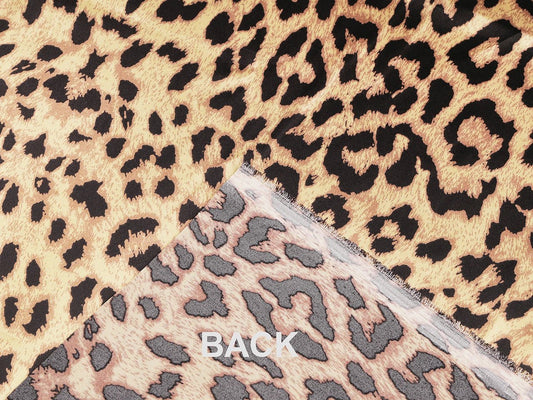 Satin leopard print available online at Charlotte's Fabrics