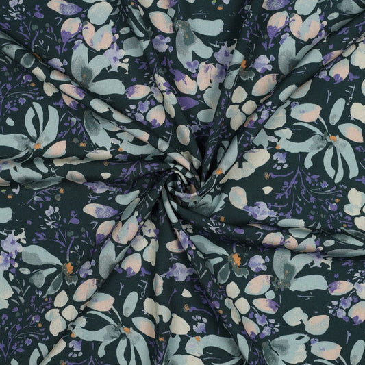 Image of viscose fabric with elastane, leaf motif on a petrol background, 135 g/m² – available at Šarlotes audumi