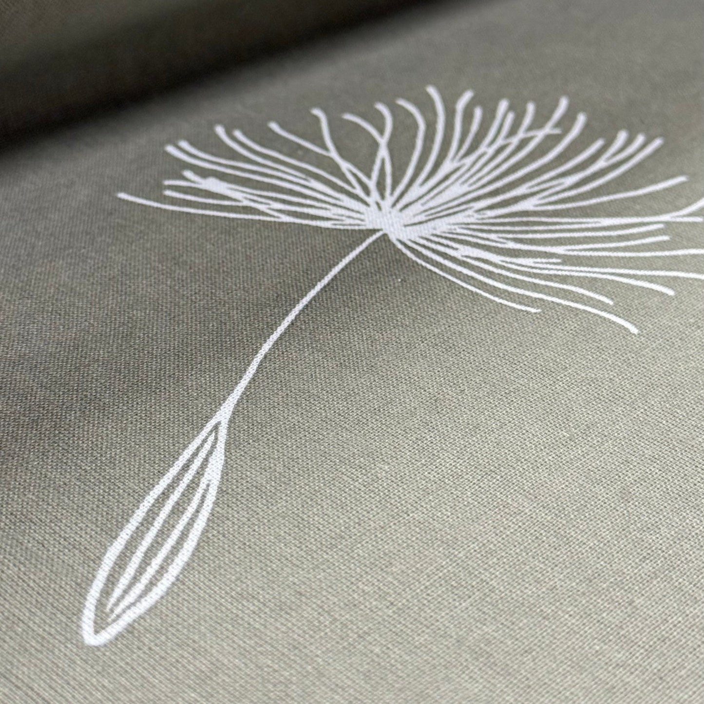 Image with 100% cotton fabric - dandelion fluff 220cm 146 g/m² – available at Šarlotes audumi