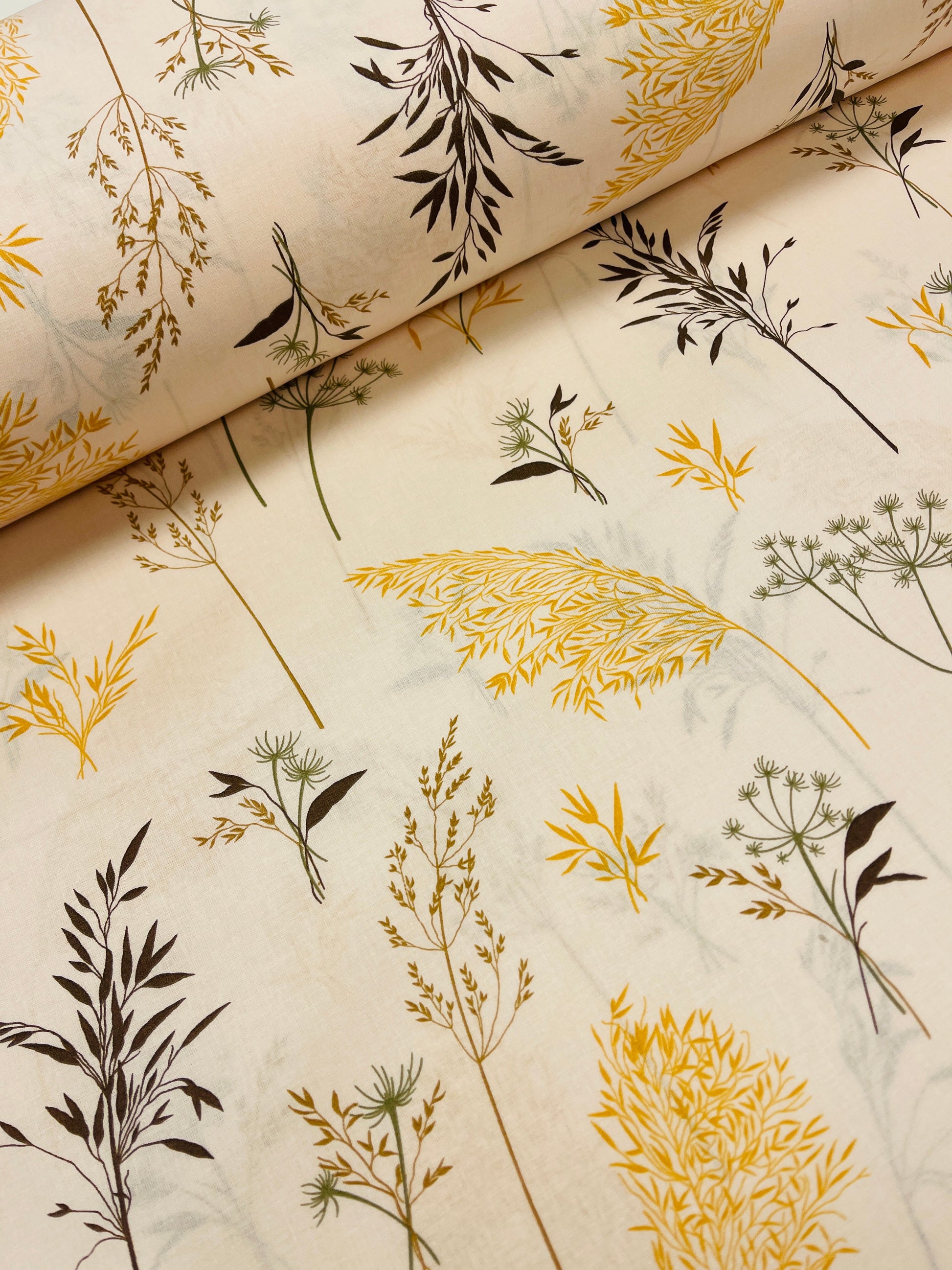 Image with 100% cotton fabric - meadow grasses on a beige background 125 g/m – available at Charlotte's Fabrics