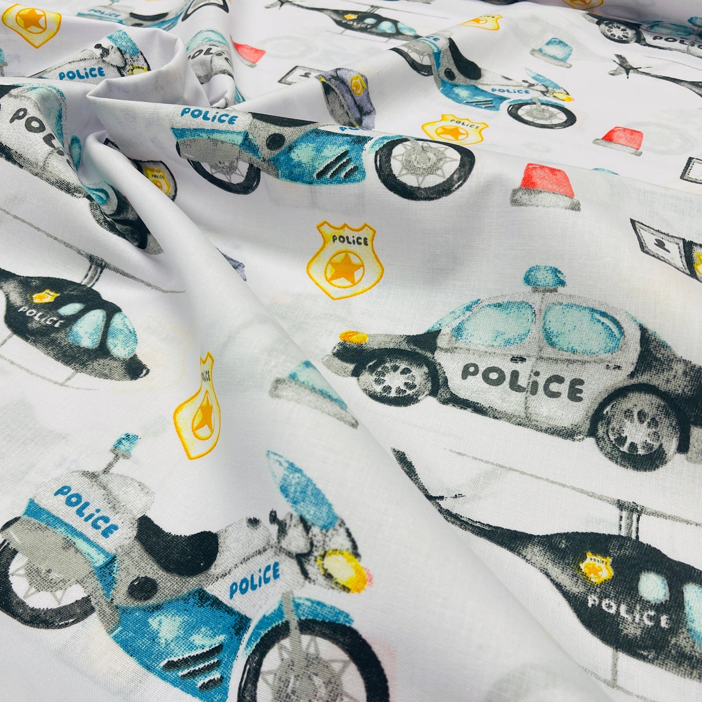 Tissu 100 % coton - véhicules de police 130 g/m²