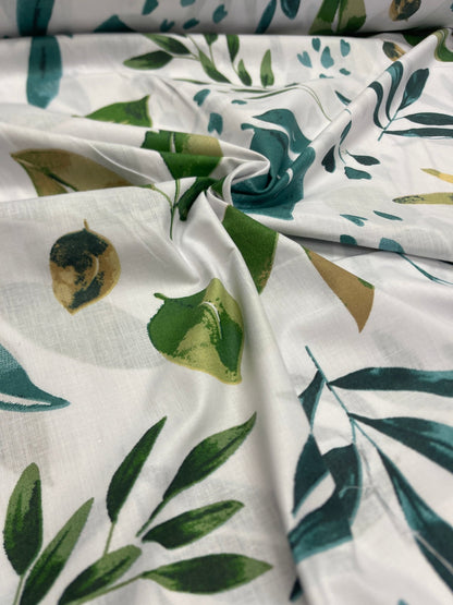 Tissu 100 % coton - feuilles vertes sur fond blanc 125 g/m