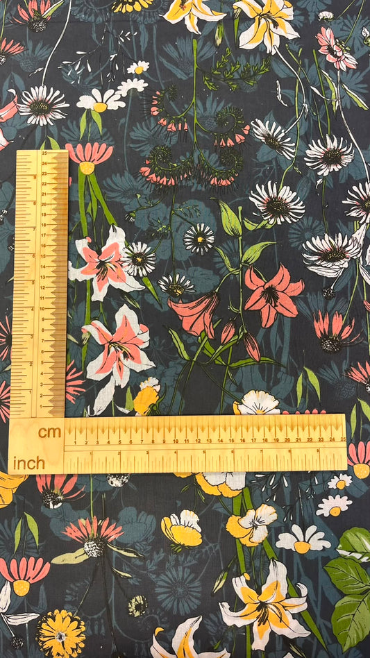 Image of 100% cotton fabric with flowers on a dark background – available online Charlotte's Fabrics