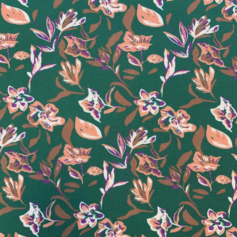 Tissu 100 % viscose - motif floral abstrait sur fond vert 125 g/m²