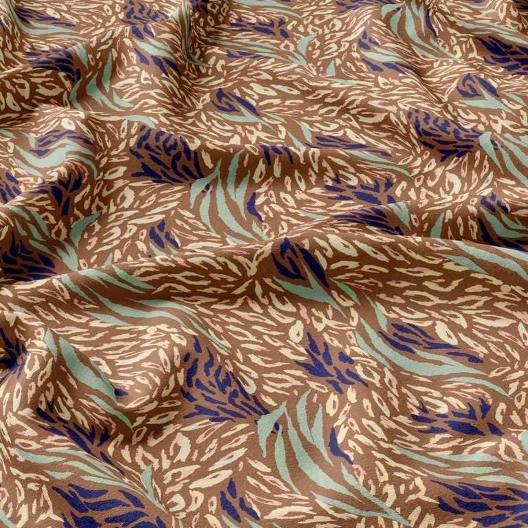 Tissu 100 % viscose brunâtre, motif menthe 125 g/m²