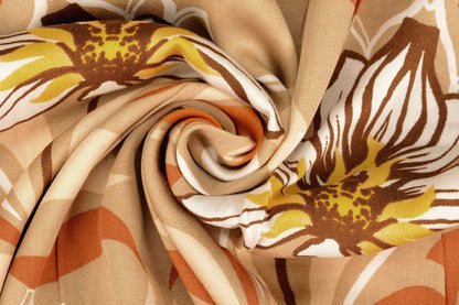 Tissu 100 % viscose - fleurs orange 100 g/m²