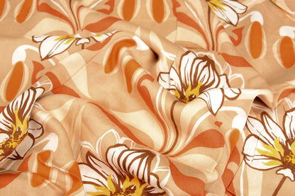Tissu 100 % viscose - fleurs orange 100 g/m²
