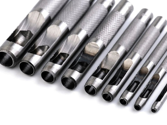 Image of a round hole punch set for fabric and leather (8 pcs) – available at Charlotte’s Fabrics
