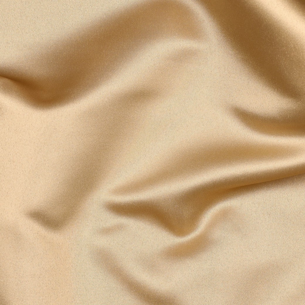 Kuva paksusta satiinikankaasta Royal Heavy Satin – beige – saatavilla verkossa Šarloten kankaat