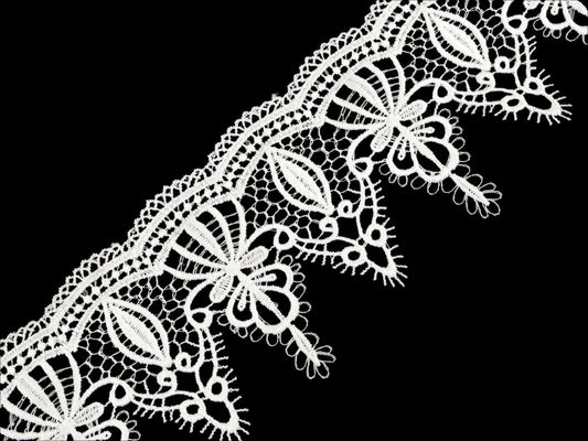 Decorative guipure lace 65 mm white – available online at Charlotte's Fabrics