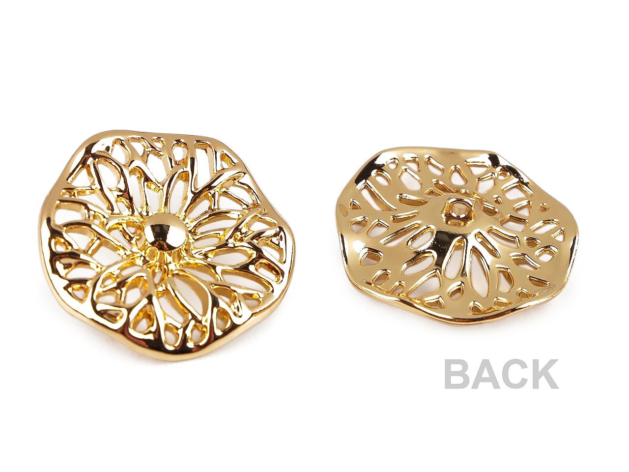 Image of a decorative metal button with an openwork floral pattern – 38 mm, silver or gold – available online at Šarlotes audumi