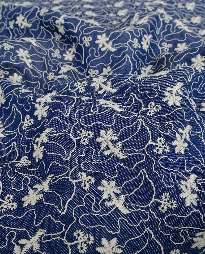 Image of denim fabric with embroidery 180 g/m² – available at Šarlotes Audumi