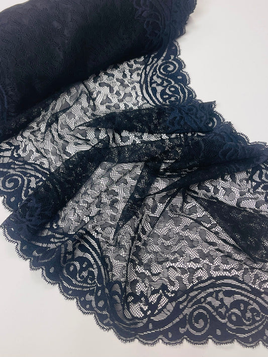 Image of elastic lace 27 cm, black with dark blue side motifs – available online at Charlotte's Fabrics