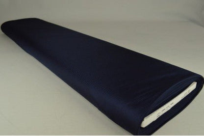 Image d’une doublure en jersey extensible - bleu foncé 75 g/m² – disponible chez Šarlotes audumi