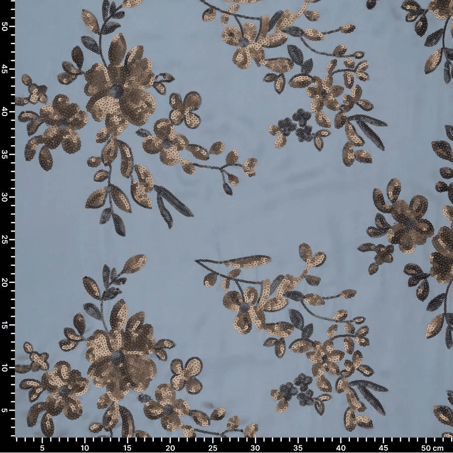 Image of flexible satin fabric with floral embroidery and sequins in blue, black and gold – available online at Charlotte's Fabrics