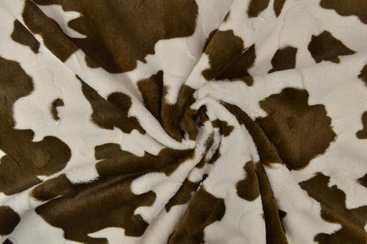 Faux fur with cow pattern – brown/white