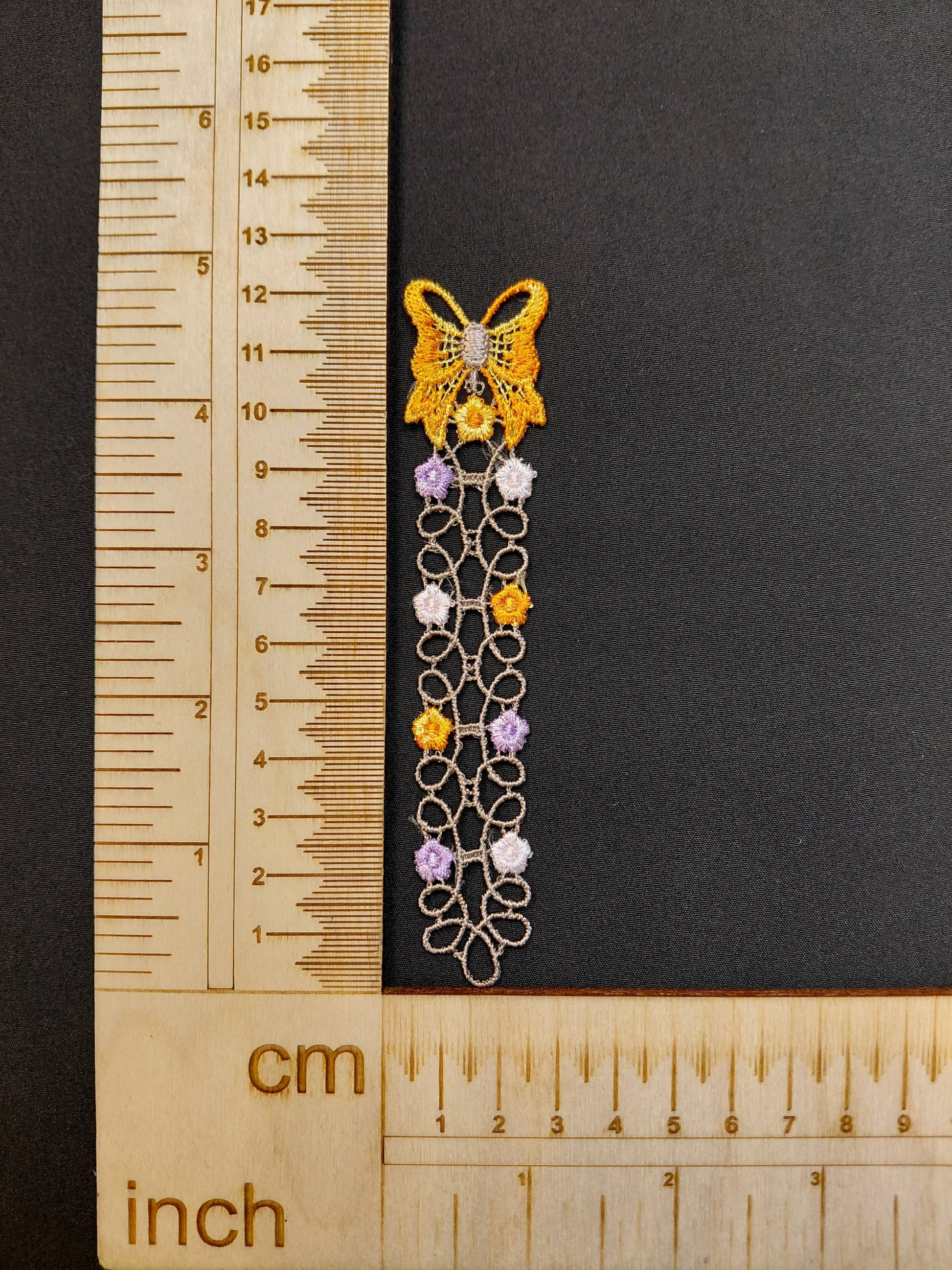 Attēls ar Ielāps/uzšuve 12 x 2 cm – pieejams Šarlotes audumi