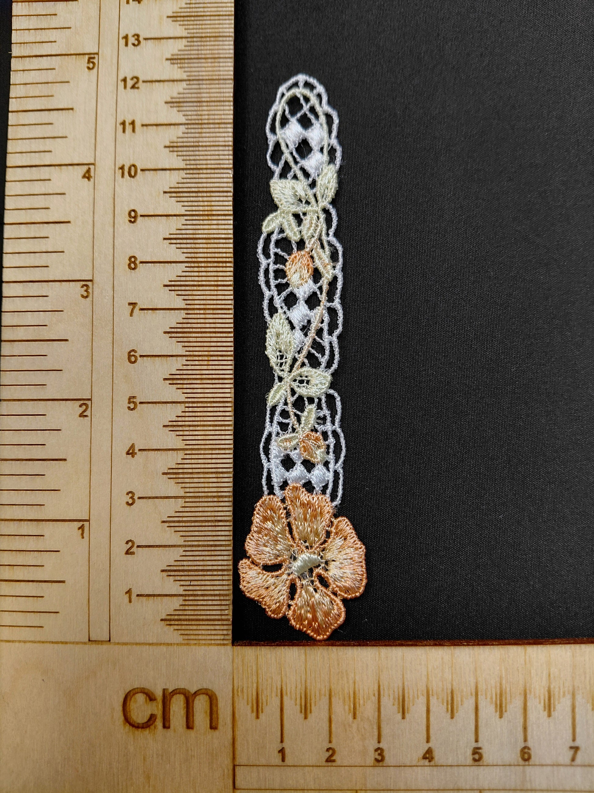 Image of patch/embroidered applique 12 x 2,5 cm – available at Šarlotes audumi