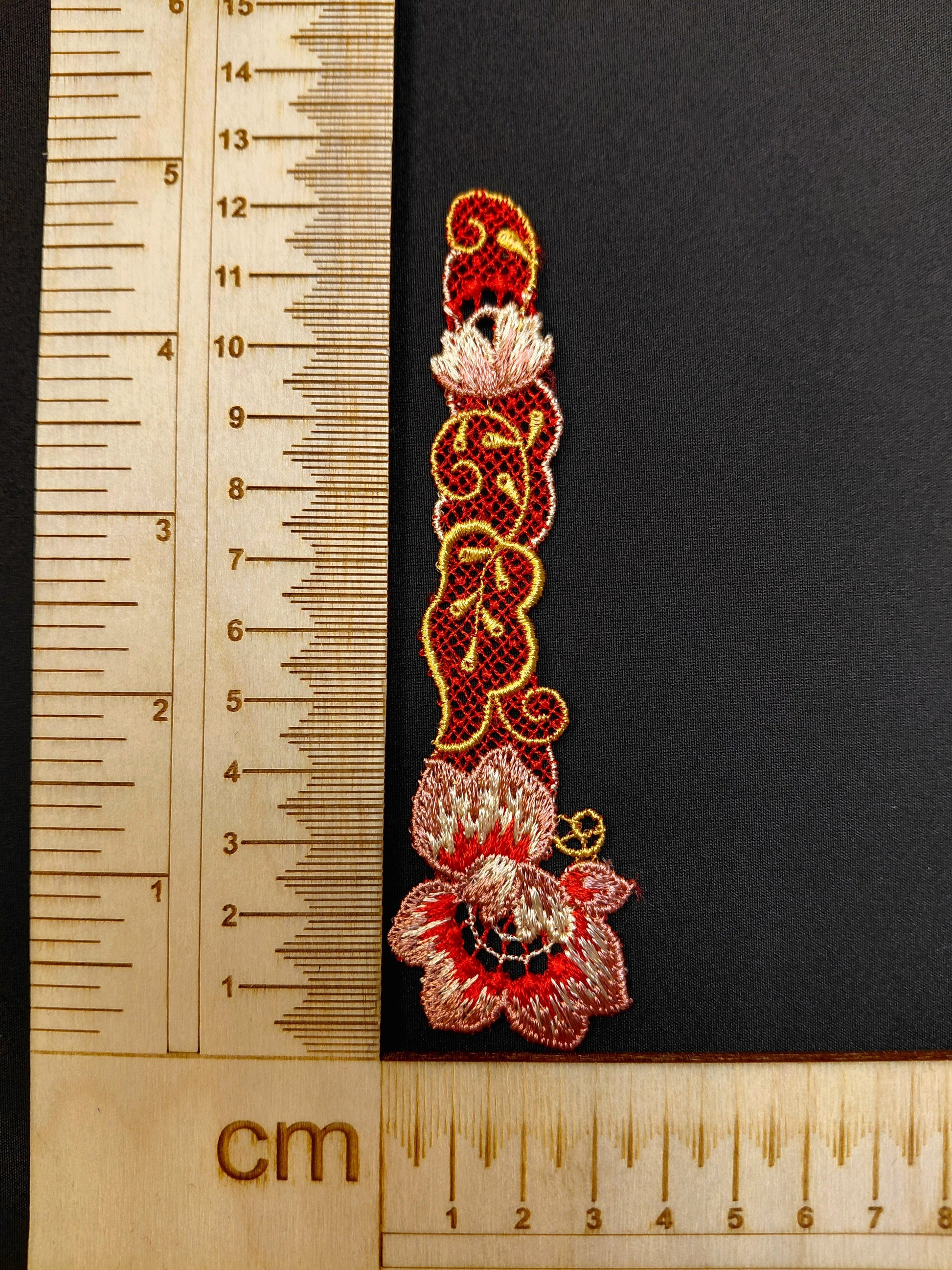 Image of patch/applique 12.5 x 3.5 cm – available at Šarlotes audumi