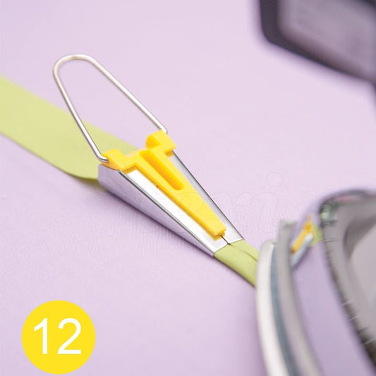 Image of a 12 mm bias tape maker tool – available online at Charlotte's Fabrics