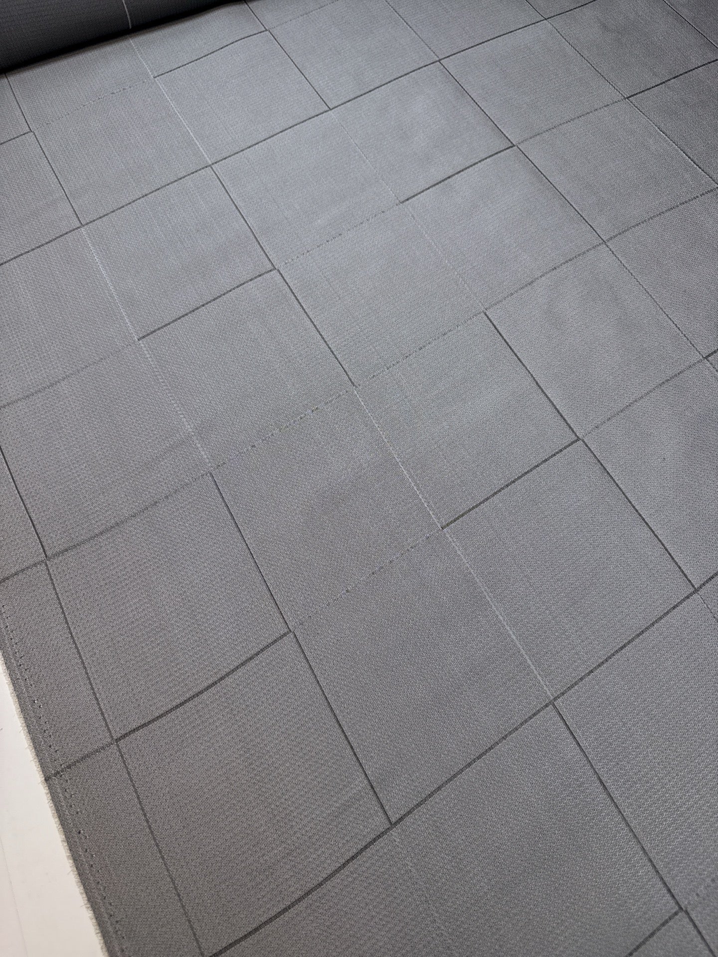 Image of Italian viscose and silk fabric in a gray check pattern – available online at Charlotte's Fabrics