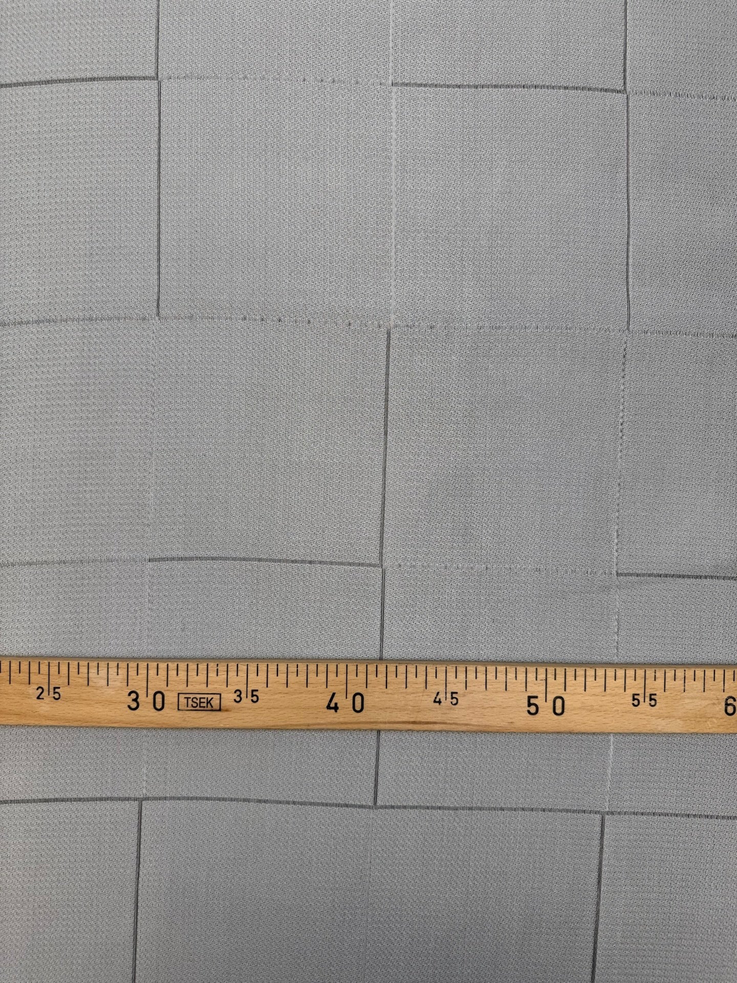 Image of Italian viscose and silk fabric in a gray checkered pattern – available online at Charlotte's Fabrics