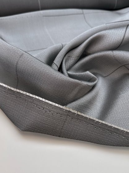 Image of Italian viscose and silk fabric in a gray check pattern – available online at Charlotte's Fabrics