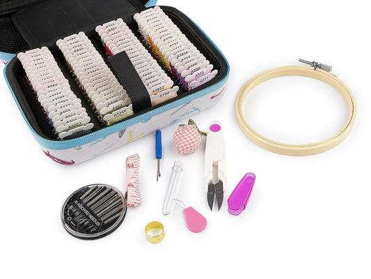 Image of an embroidery kit in a case with embroidery floss and tools – available at Charlotte's Fabrics