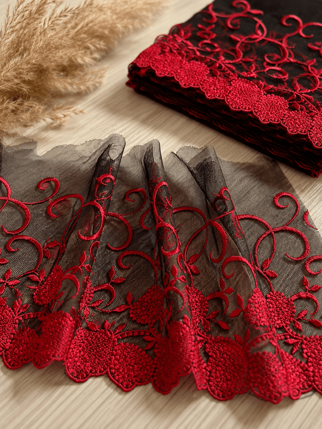 Image of embroidered lace 15 cm - black with red accents - available at Šarlotes audumi