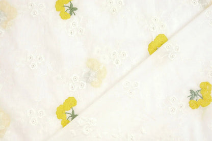 Bestickter Baumwollstoff mit gelben Blumen 110 g/m²