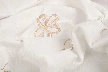 Tissu en coton brodé - fleurs 110 g/m²