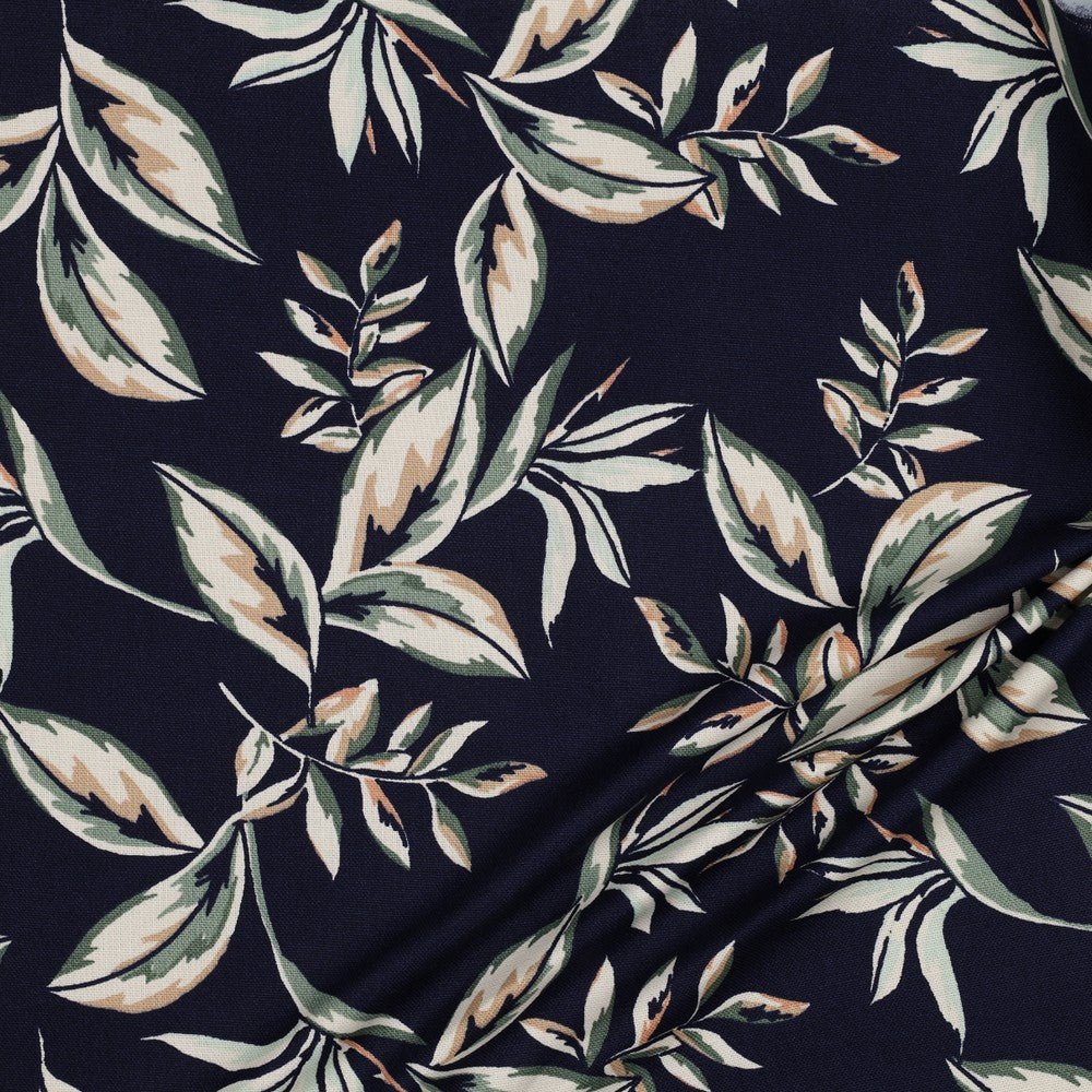 Tissu canvas - feuilles sur fond bleu foncé 225 g/m²