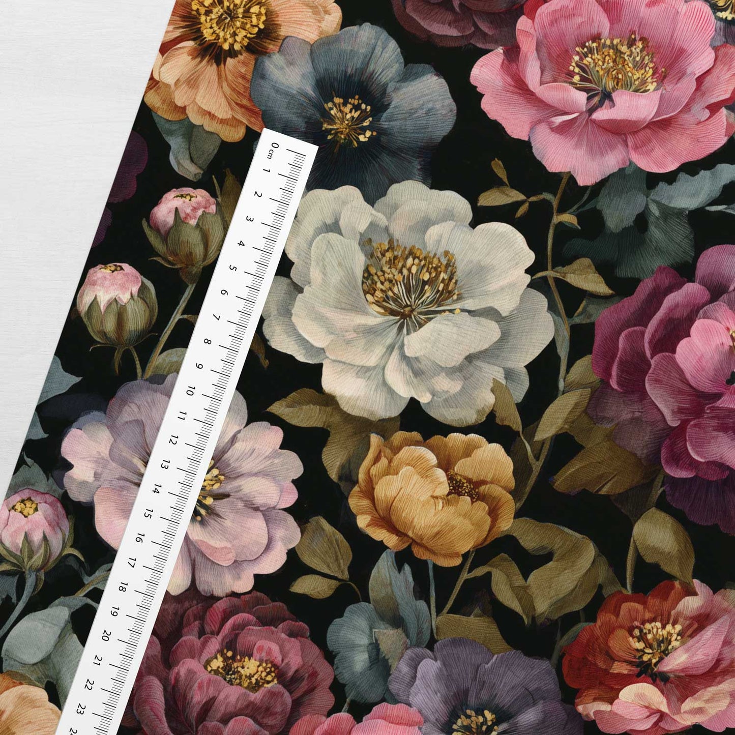 Image of cotton loopback jersey with beautiful flowers on a black background – available online at Šarlotes audumi
