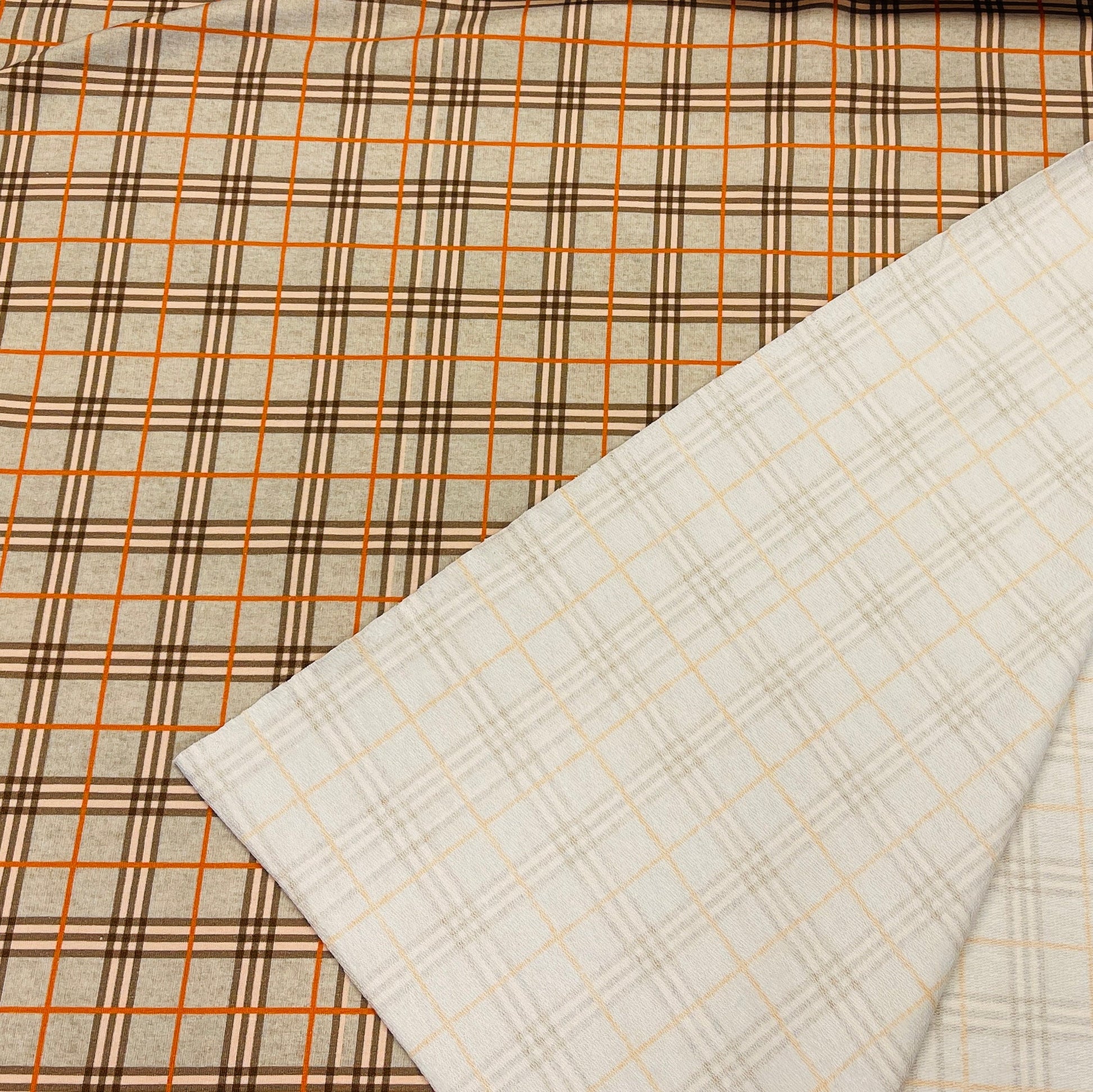 Maille bouclette en coton à carreaux 250 g/m²