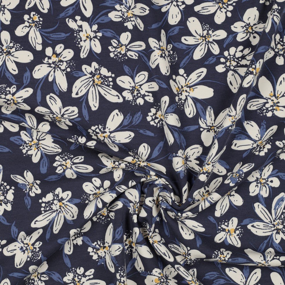 Maille bouclée en coton - motif floral bleu 225 g/m²