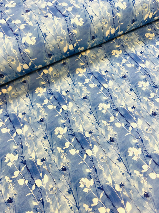 Image of cotton loop knit - blue and white leaf motif 245 g/m² – available at Šarlotes audumi