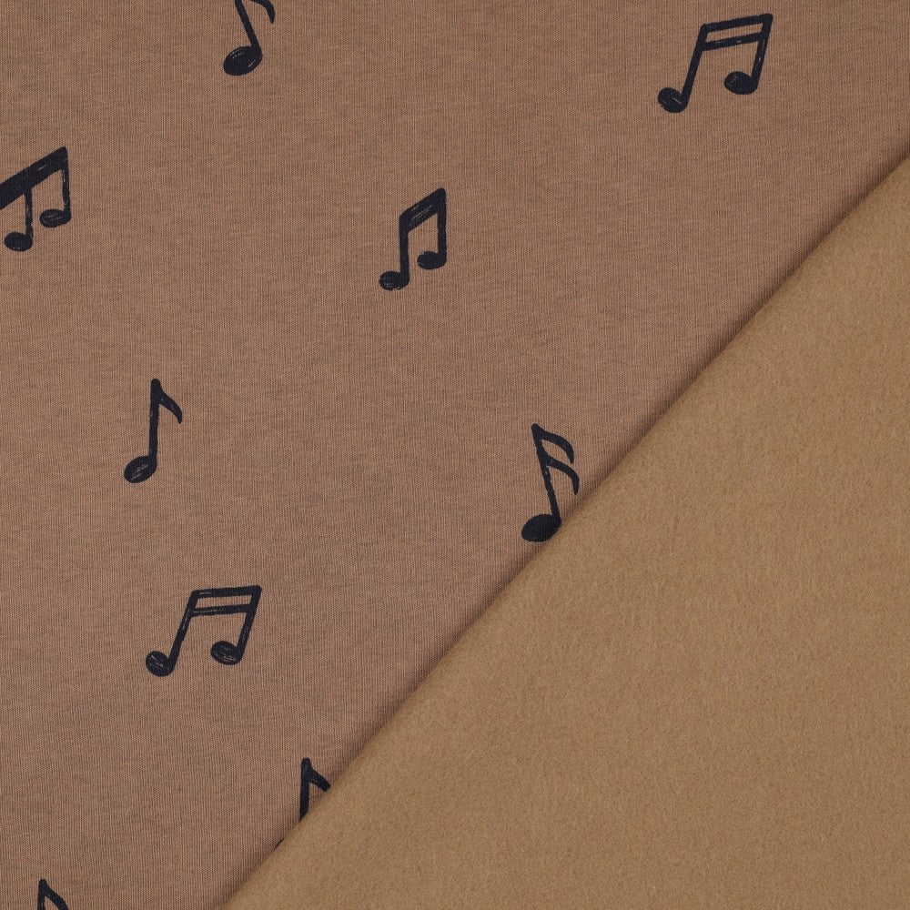 Image de maille en coton molletonnée - musique 285 g/m² – disponible chez Tissus de Charlotte