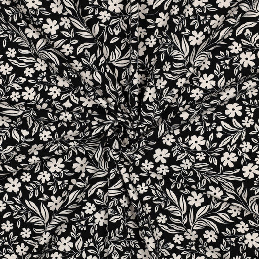 Image with cotton jersey - white flowers on black 200 g/m² – available at Šarlotes audumi