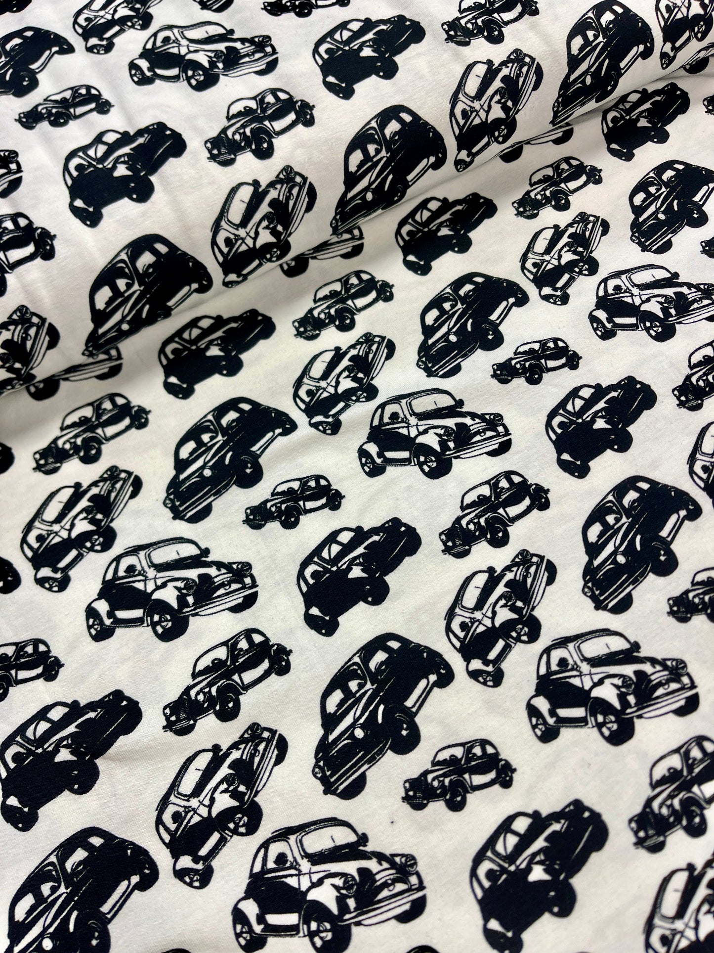 Cotton jersey - black cars on a white background 200 g/m²