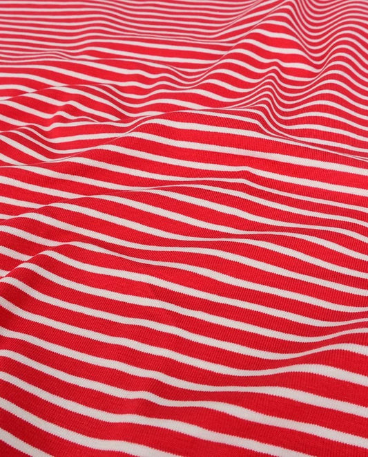 Image with cotton knit fabric - red stripes 220 g/m² – available at Šarlotes audumi