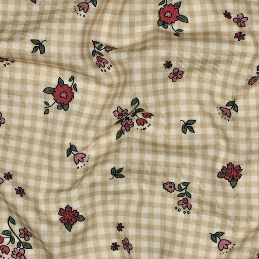 Image with cotton knit fabric - small flowers on a checkered background 220 g/m² (GOTS certified) – available at Šarlotes audumi