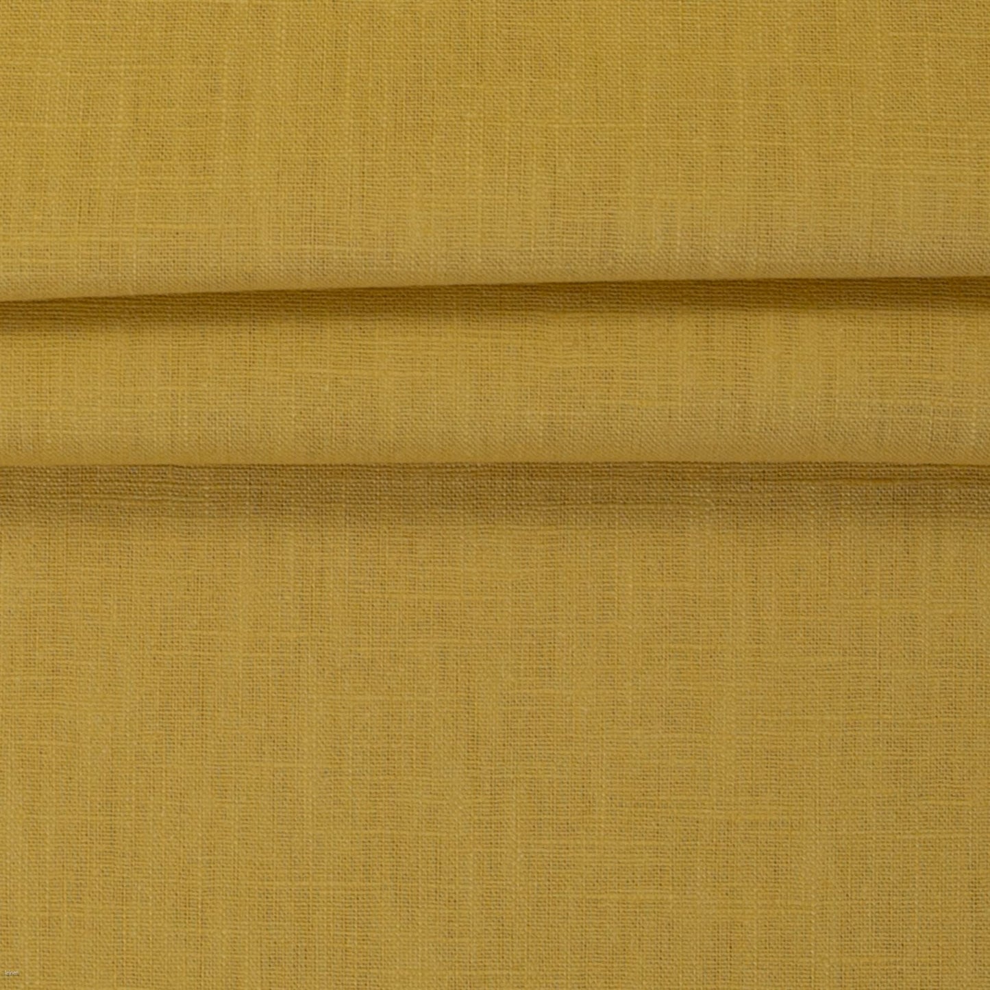 Image de tissu en lin – moutarde 235 g/m² – disponible chez Šarlotes audumi