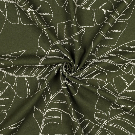 Image of linen with viscose-embroidered leaves on a green background, 210 g/m² – available at Šarlotes audumi